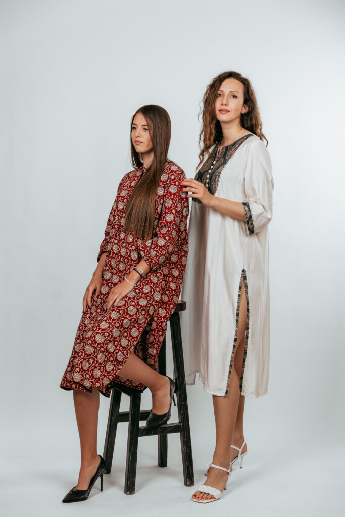 Unique clothing Nureteka red and white dresses inspired by India