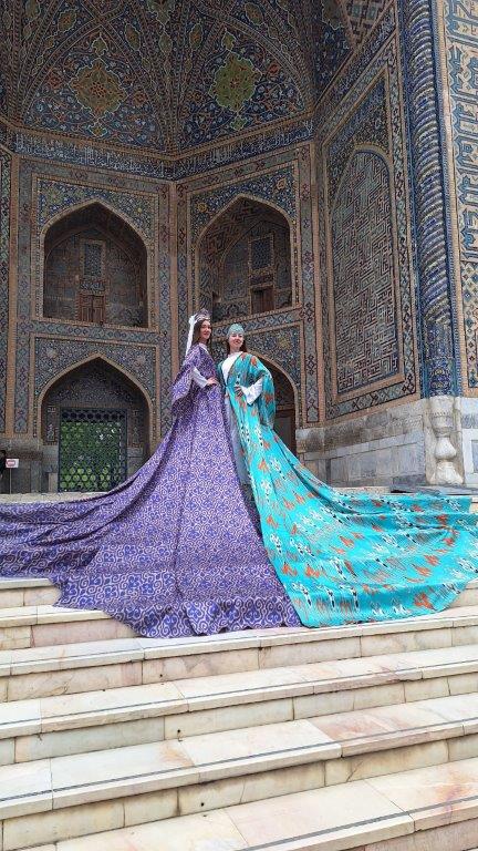 Purple and green dresses inspired by India