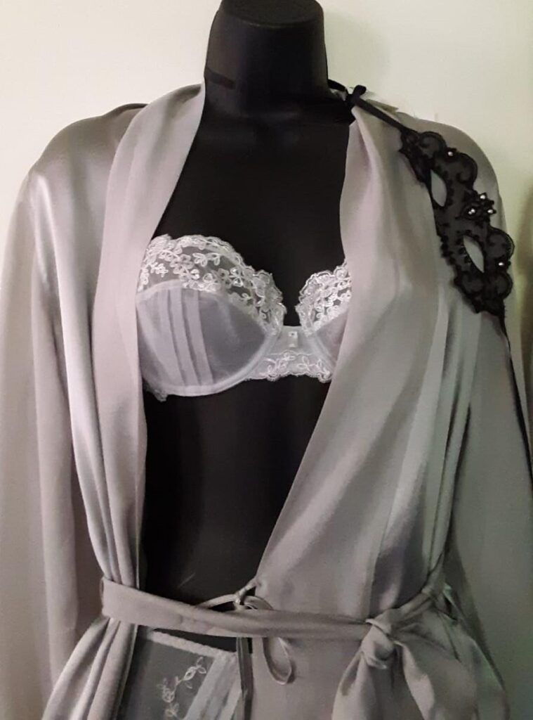 Intimate Apparel silver lingerie on a doll