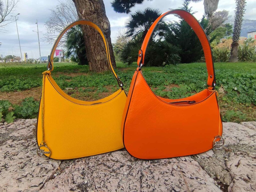 orange and yellow leather bag